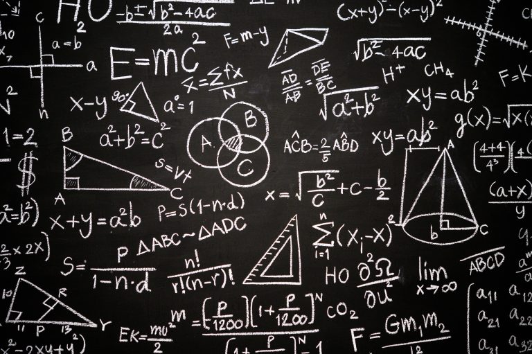blackboard inscribed with scientific formulas calculations min